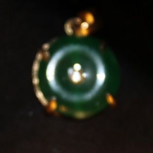 14 karat gold with jade pendent